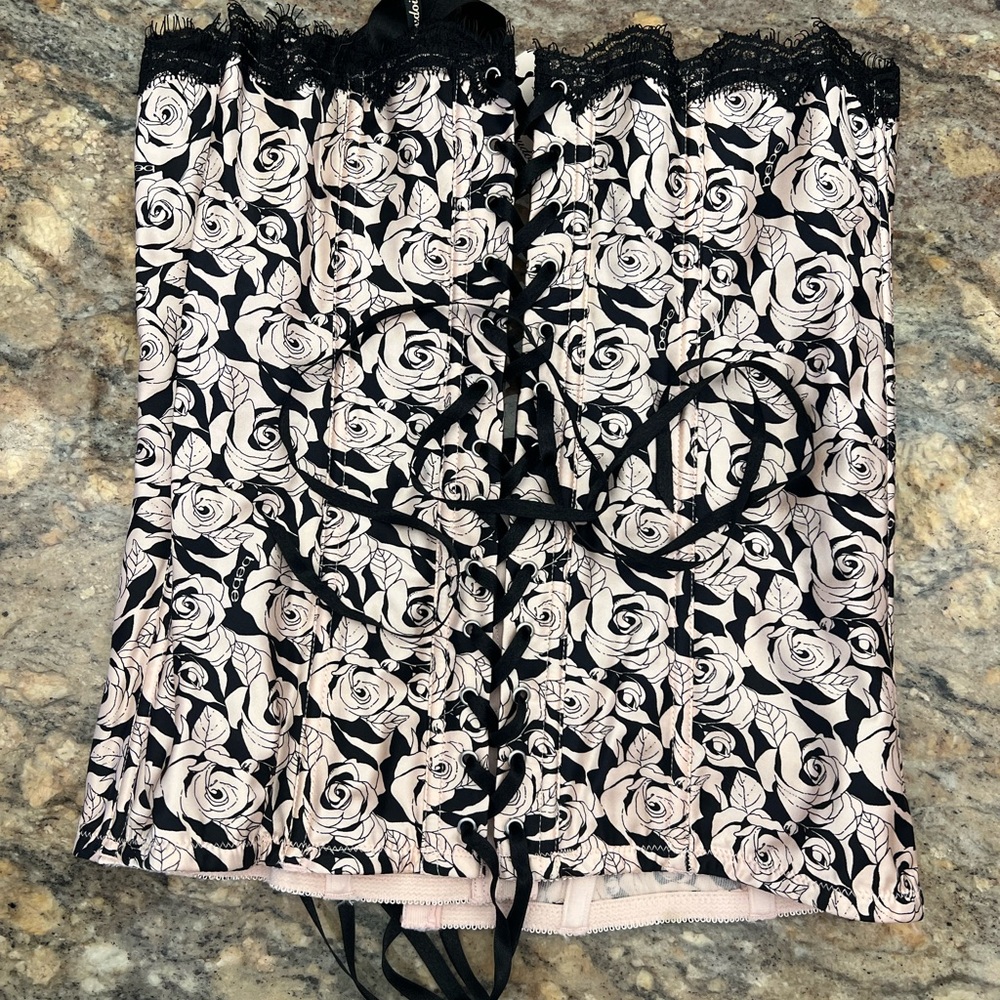 Elegant Black and light pink Floral Corset by BEBE. NWT